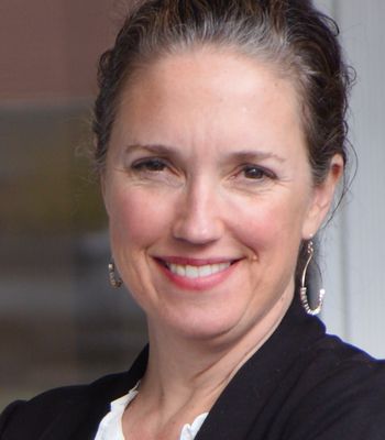 Portrait of Meg Anderson, REALTOR, Broker.